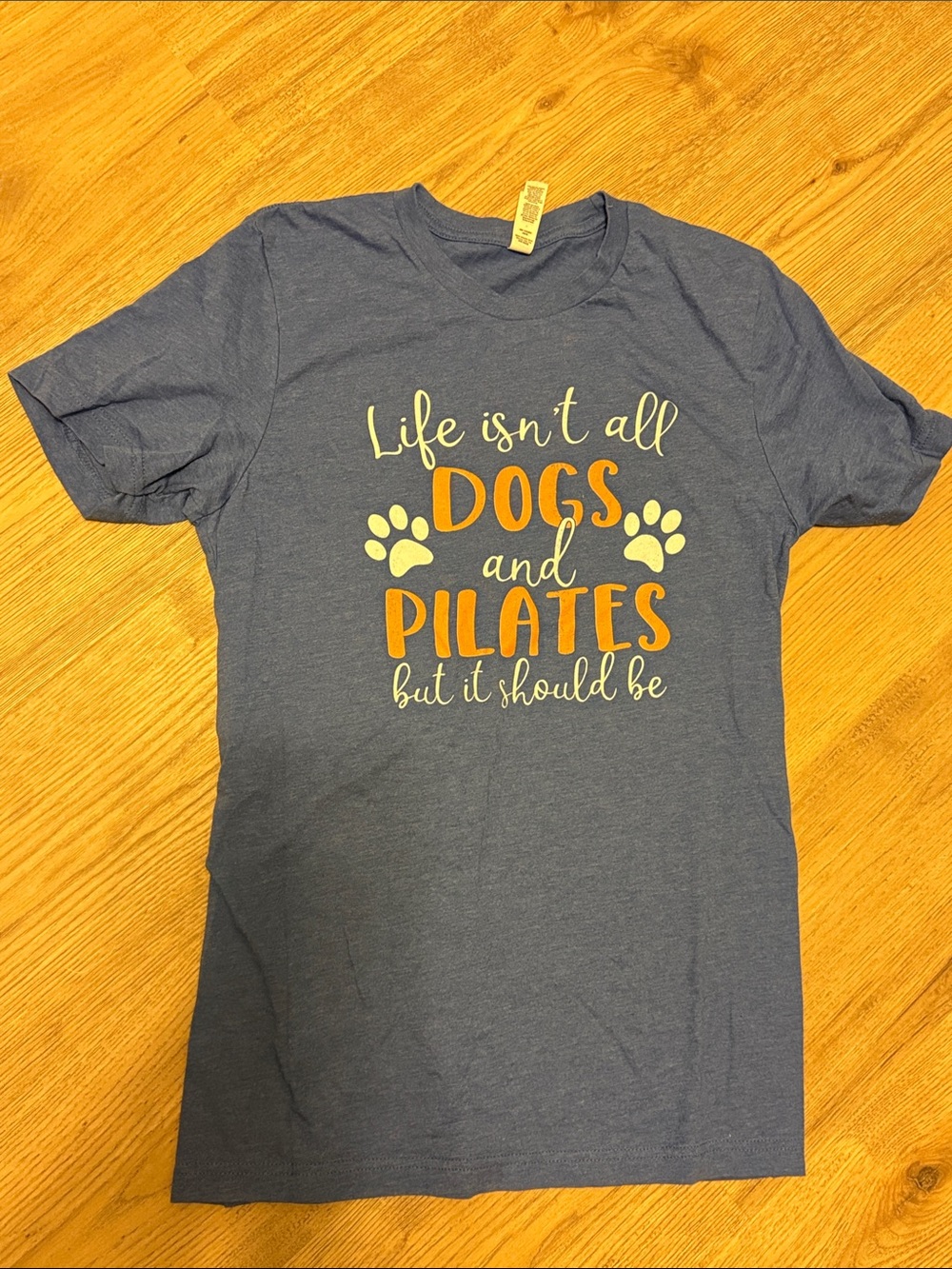 Bella Canvas Blue Tee with Orange & Cream 'Dogs and Pilates' Design